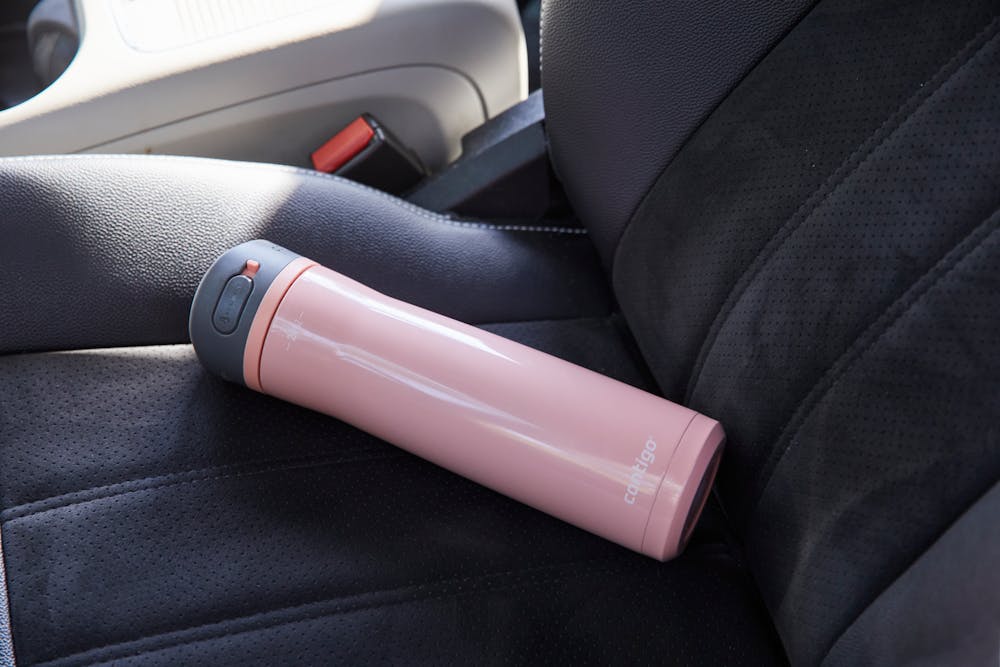 water bottle on seat in car